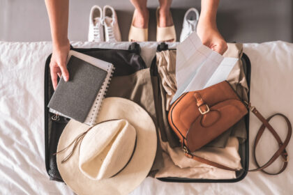 Travel. Staycation.local travel new normal.Girl traveler packing luggage in suitcase Travel,tourism,