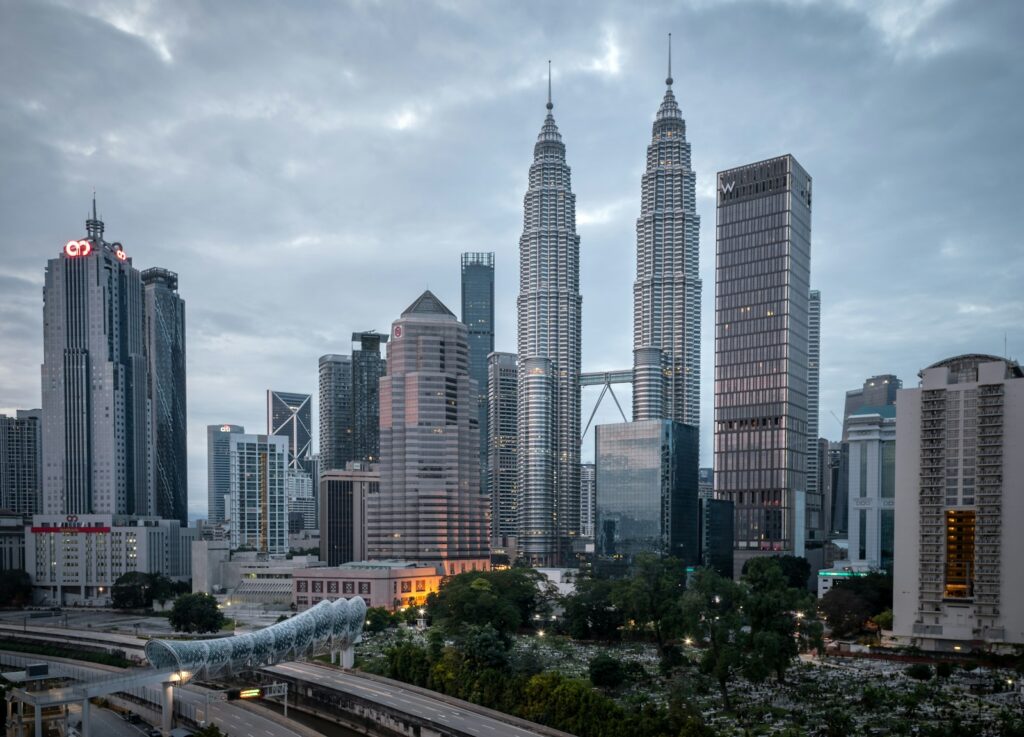 city buildings under white cloudy sky during daytime