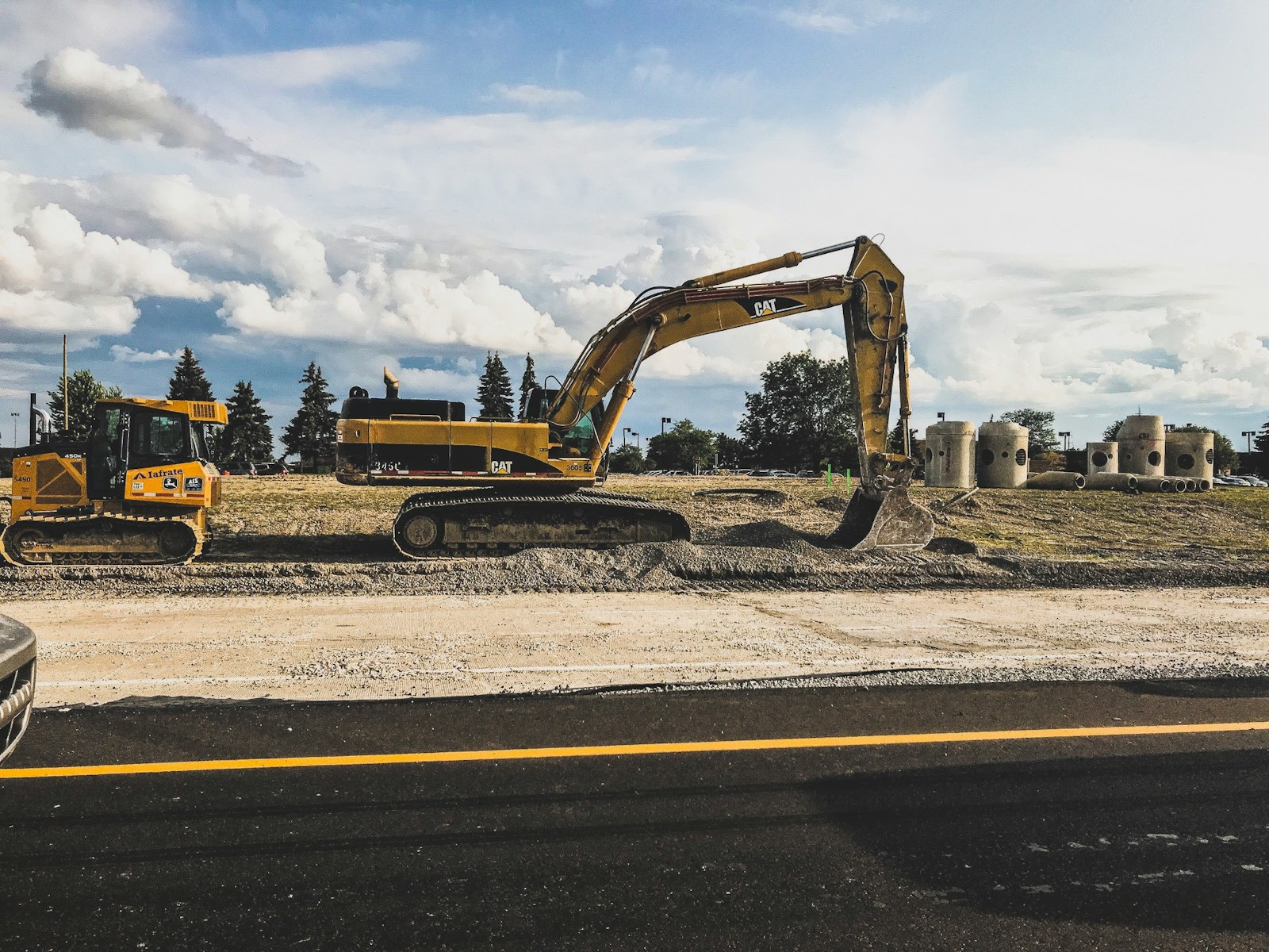 The Dangers of Overloaded Construction Vehicles Spilling Debris onto Roads
