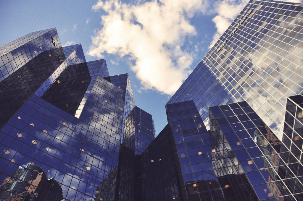 low angle photo of curtain wall building, law firm, best law firm