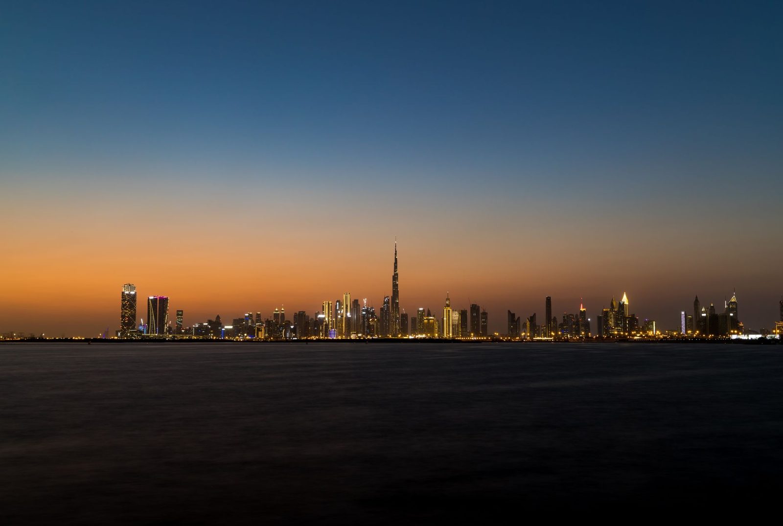 Stunning view of Dubai's skyline at twilight featuring the iconic Burj Khalifa.