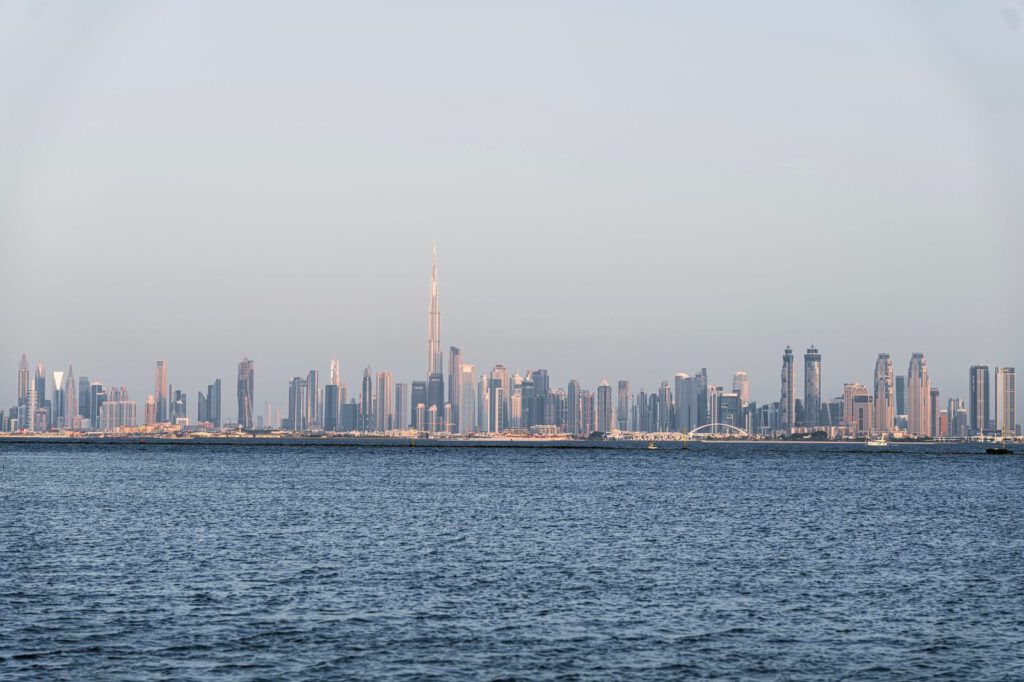 A stunning view of Dubai's skyline featuring Burj Khalifa across the sea.