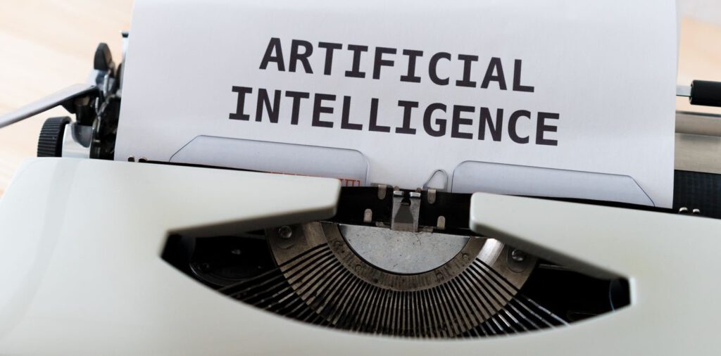Sheet of paper reading artificial intelligence loaded in a vintage typewriter