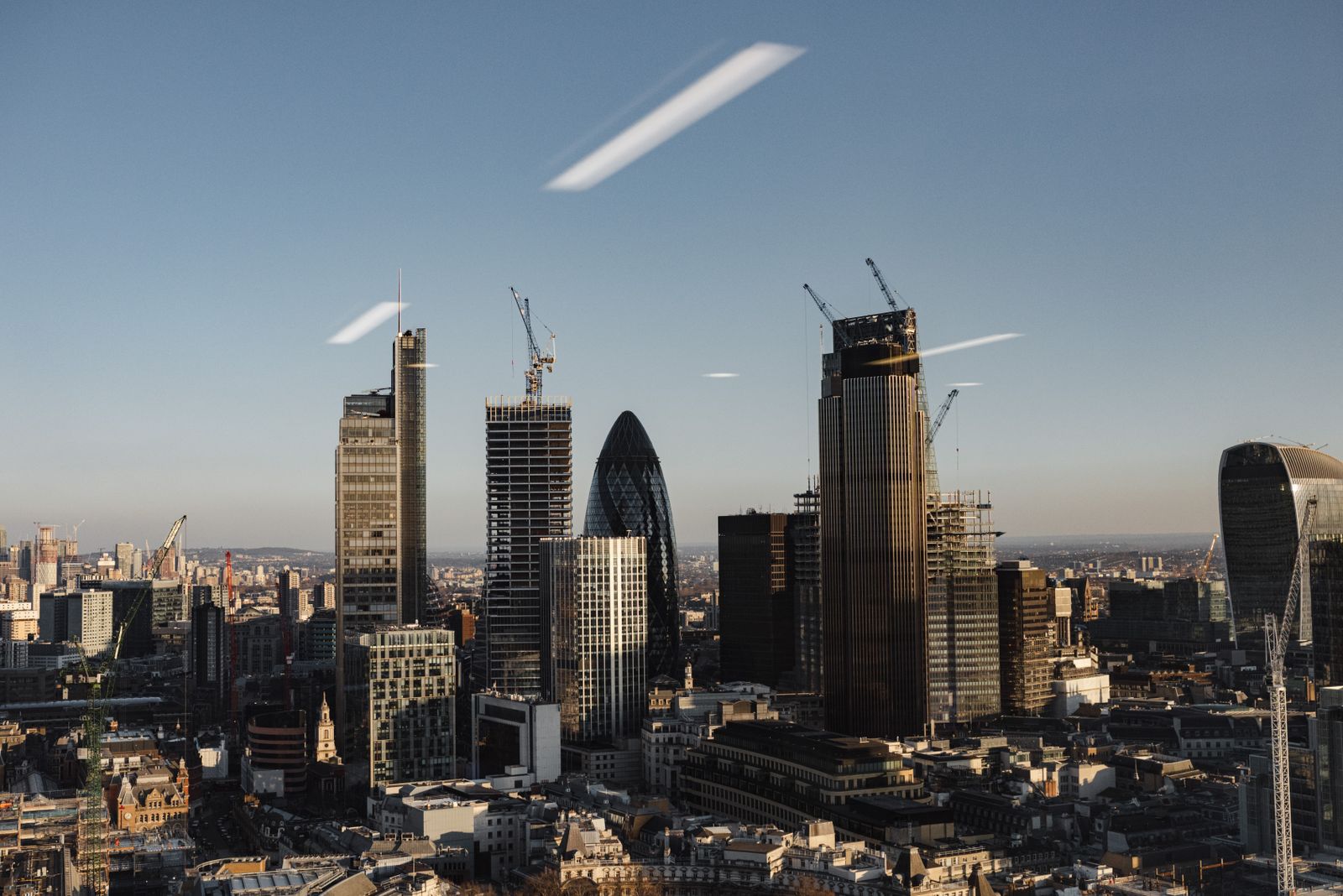 City of London skyline with office towers including the Gherkin, home to many large law firms